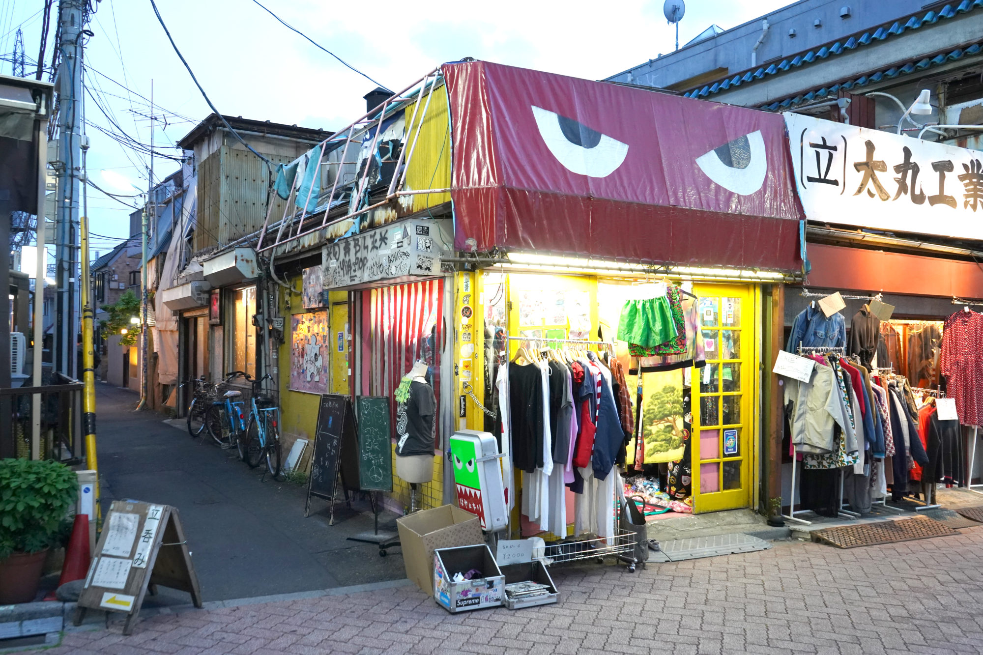 A street corner in Tokyo with a used clothing store