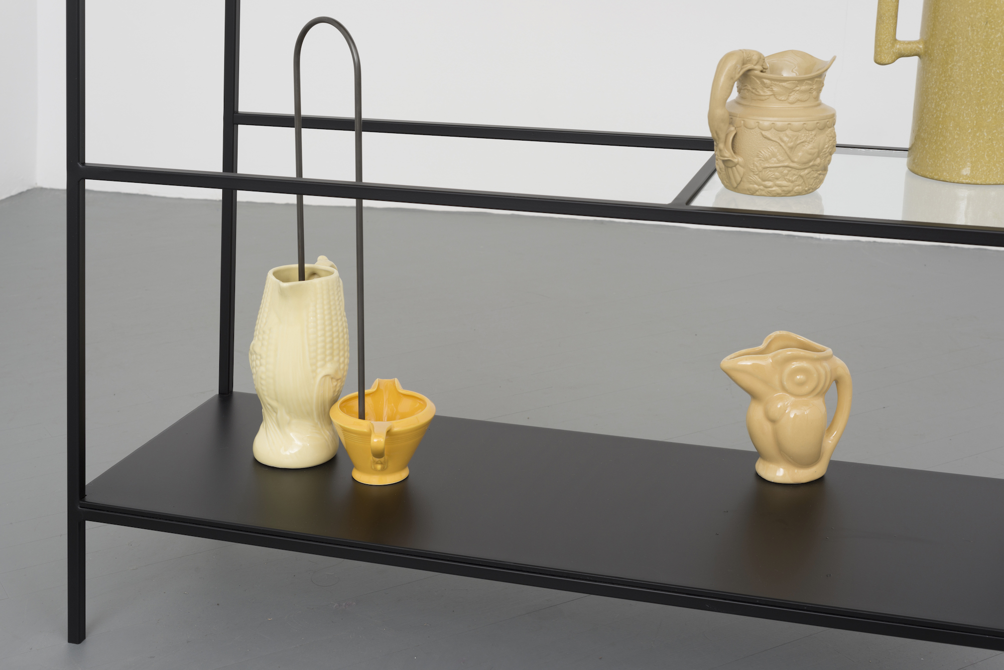 ceramic vessels on a shelf