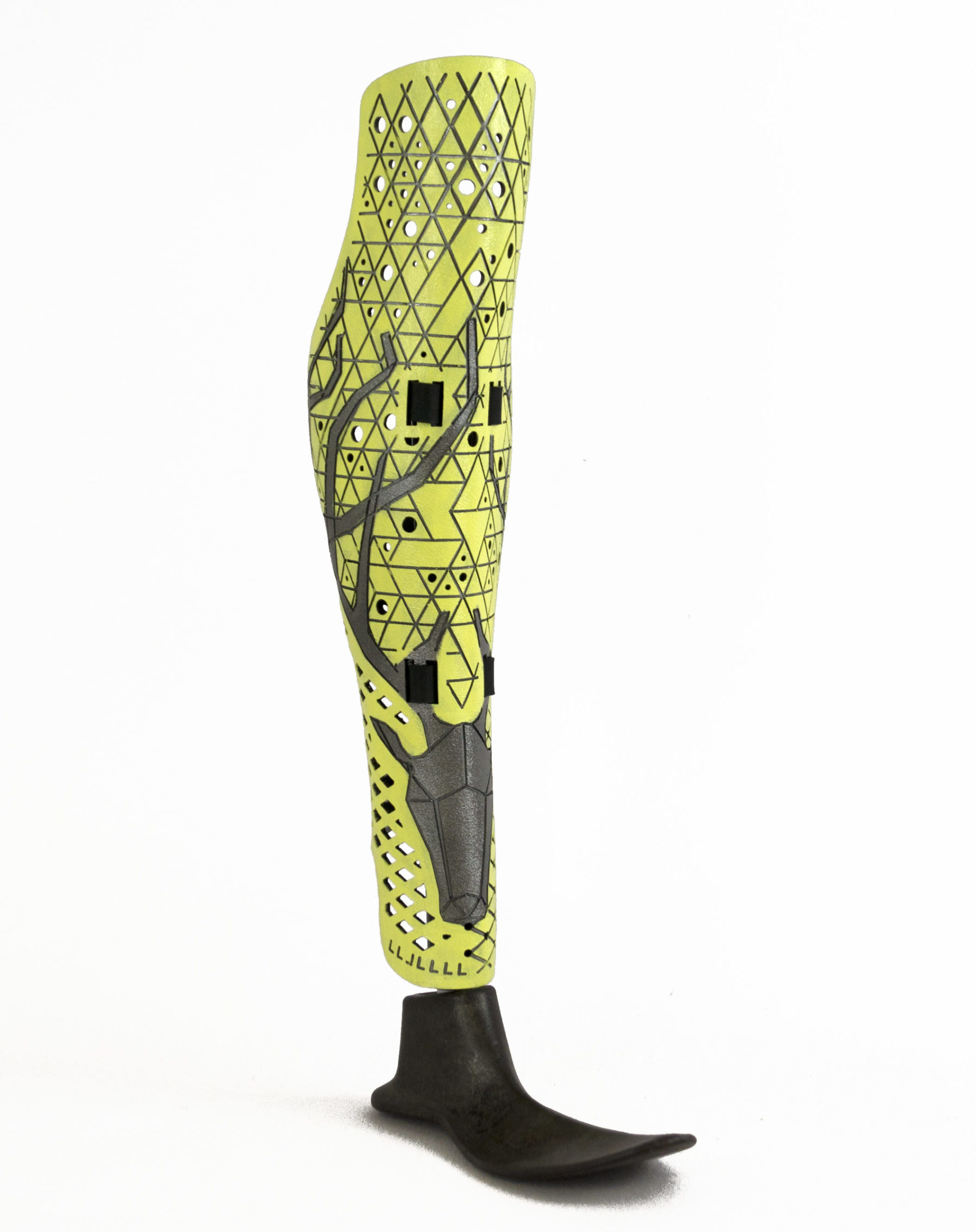 yellow prosthetic leg with geometric design