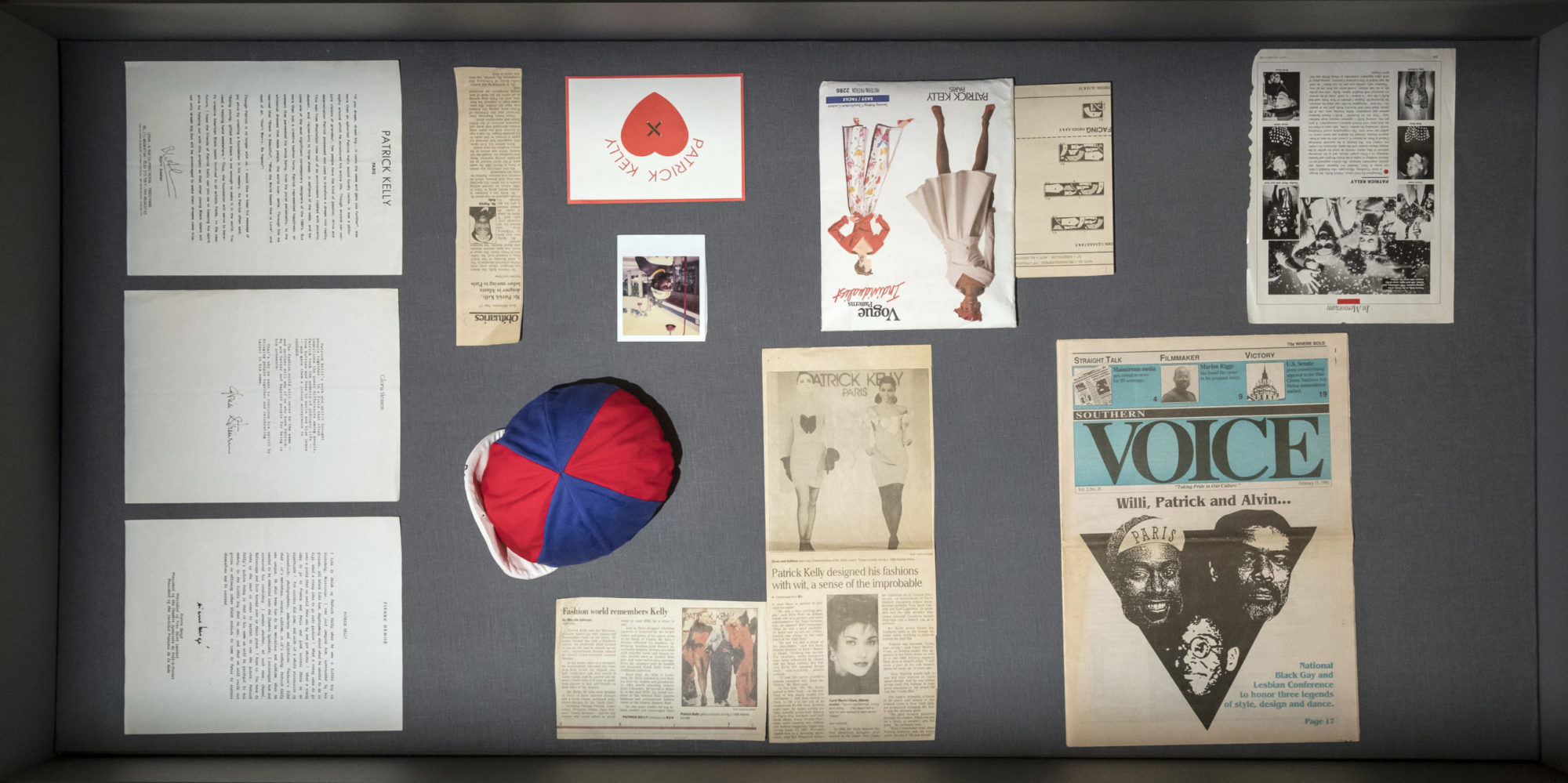 Shadow box with different news clippings and other sentimental items