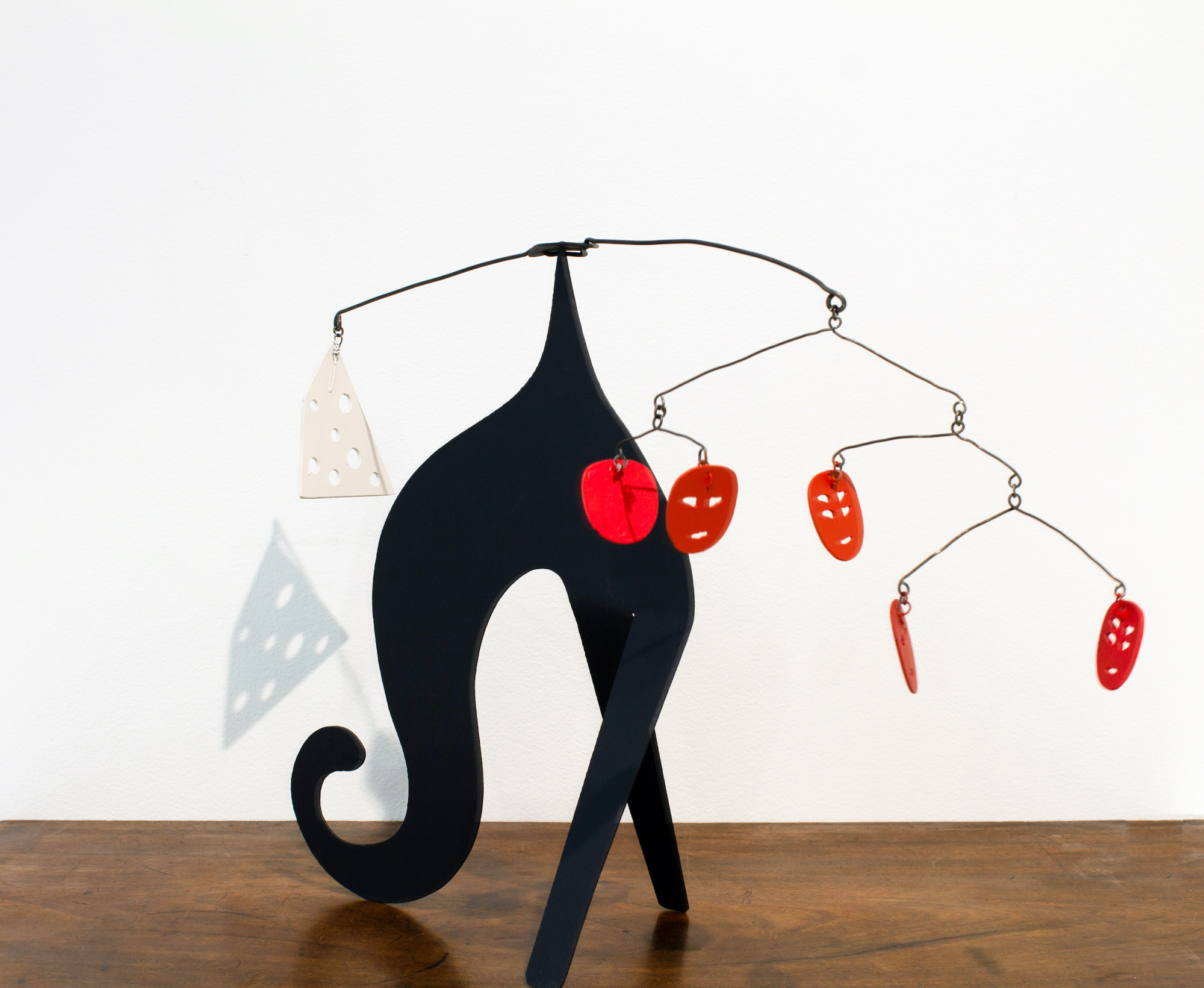 Calder-like sculpture with cat-like forms