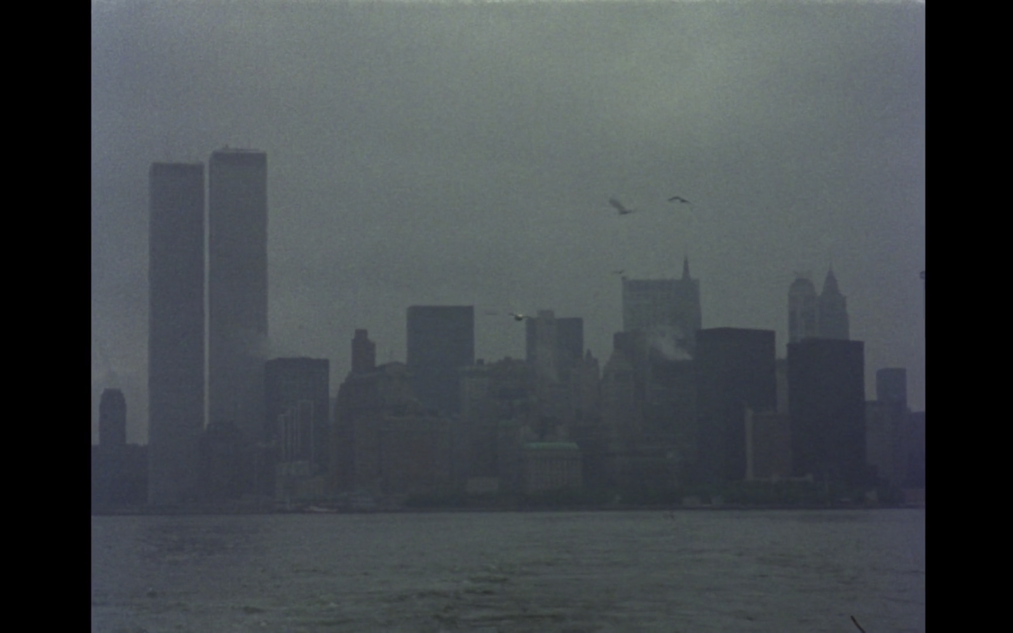 Screenshot from film News From Home of New York City skyline