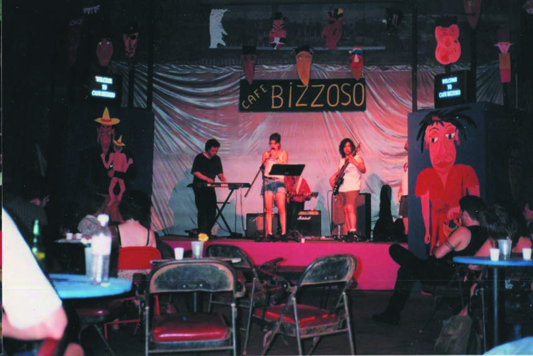 A photo of a band set up to perform at Cafe Bizzosos.