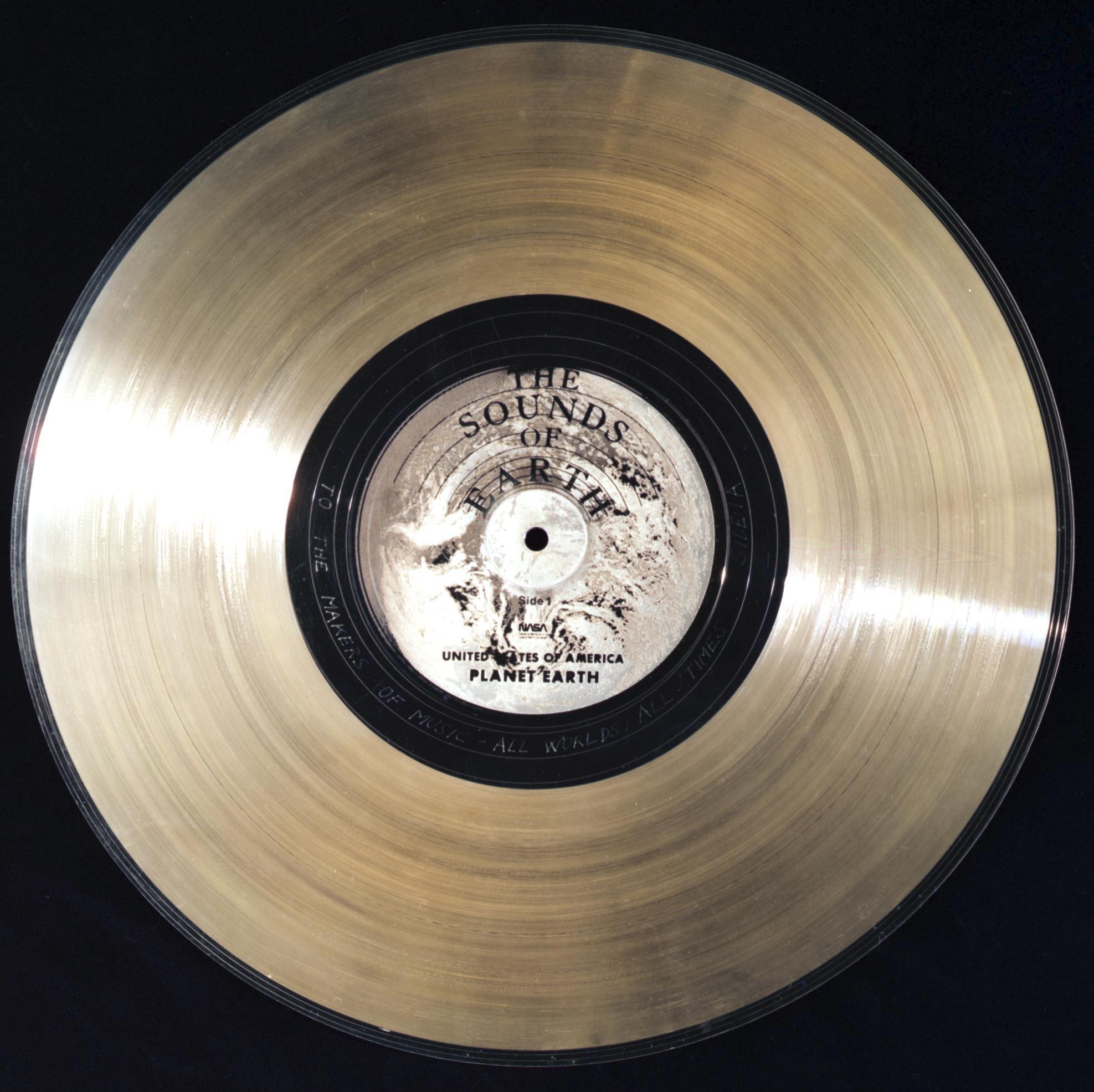 Large gold record that was sent into space on Voyager missions.