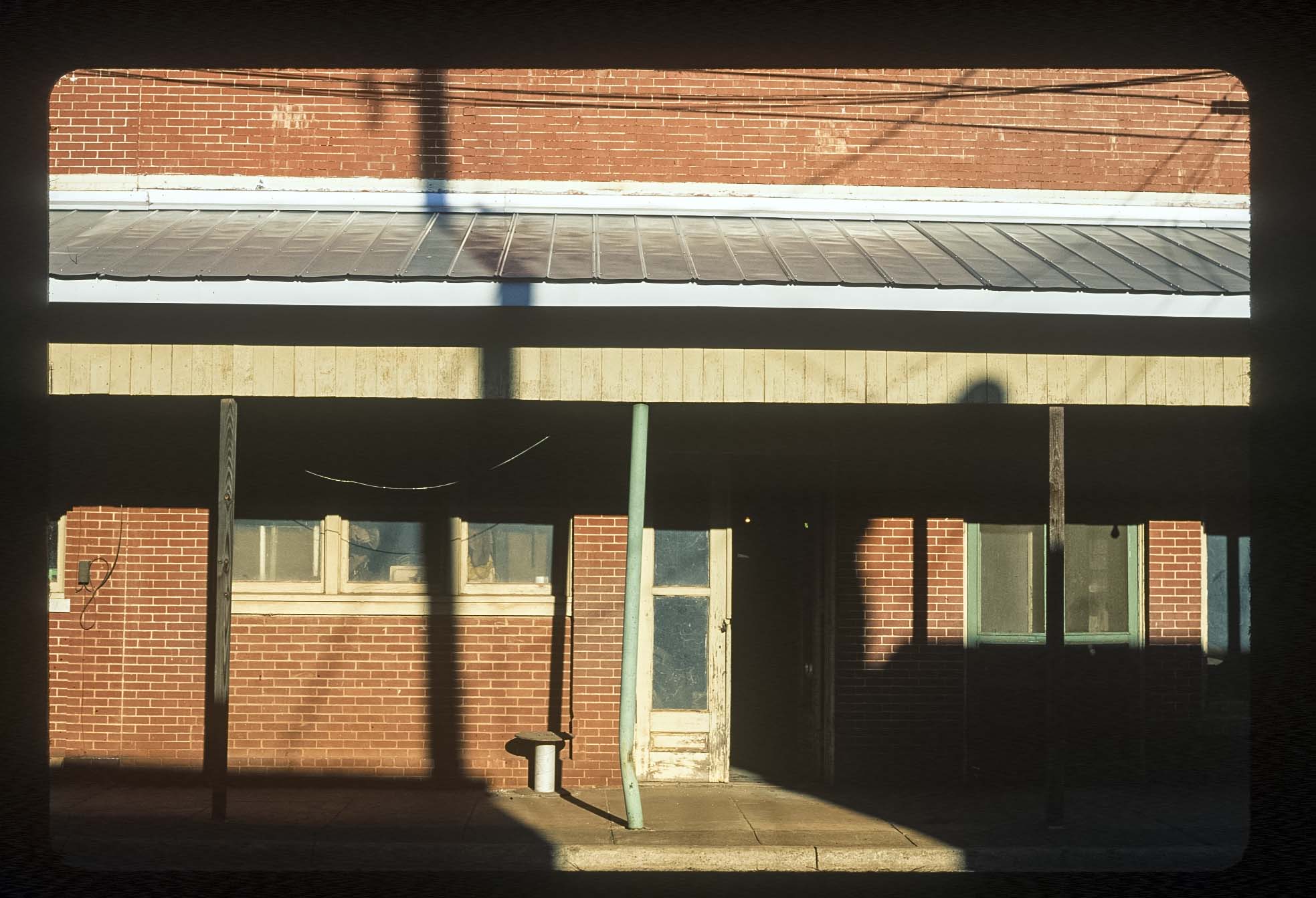 Shadows casted on a brick building