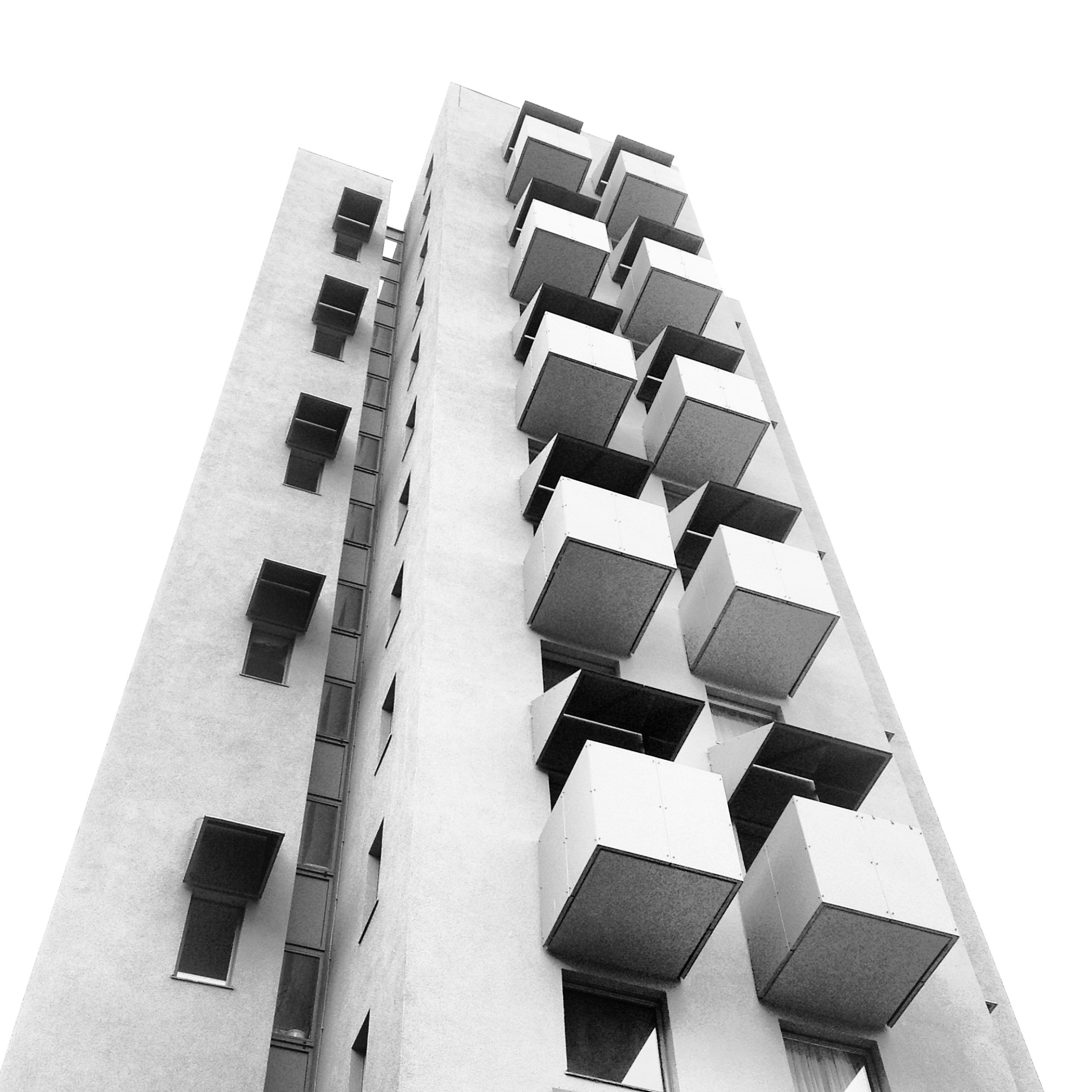 A black and white abstract architectural image of a highrise