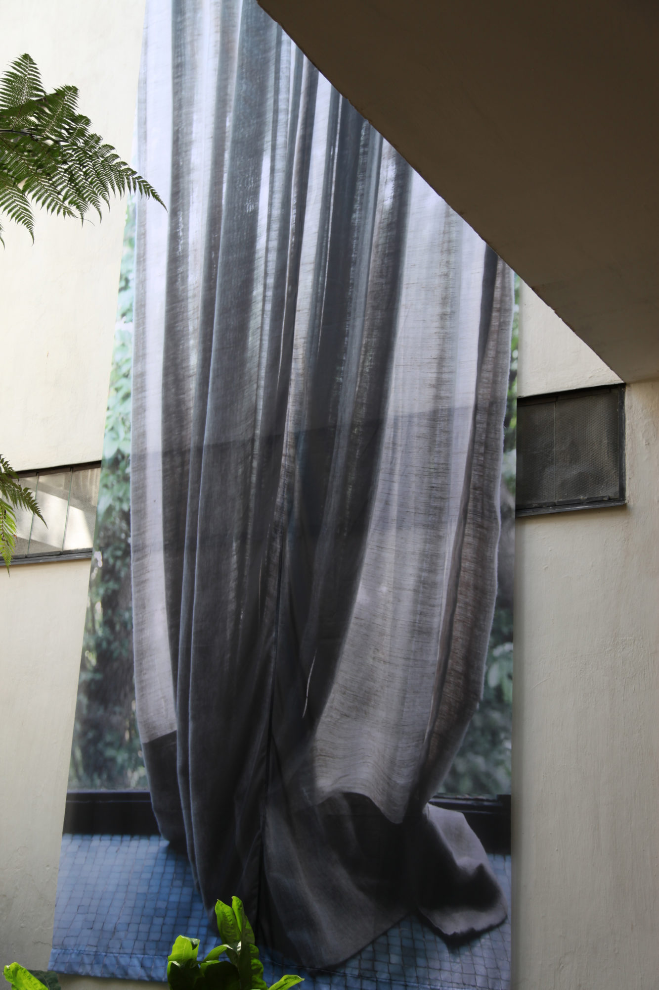 An installation view of Veronika Kellndorfer's Curtain courtyard and reflection, 2016.