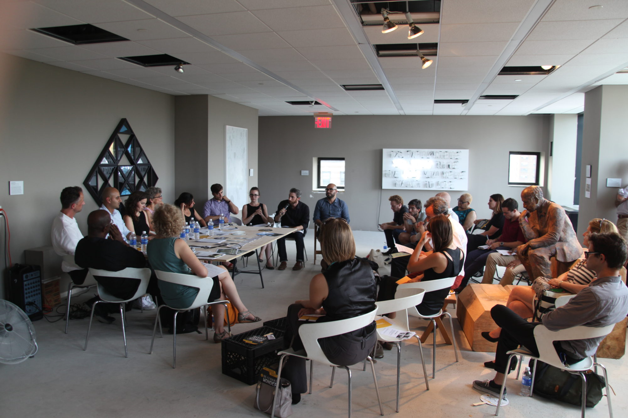 A conference room filled with people.