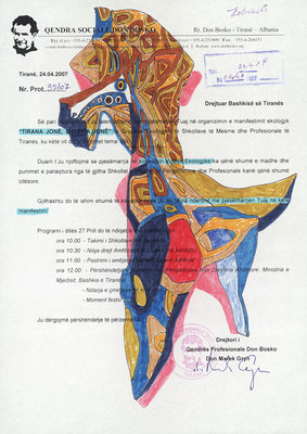 A colorful, abstract drawing on a sheet of paper