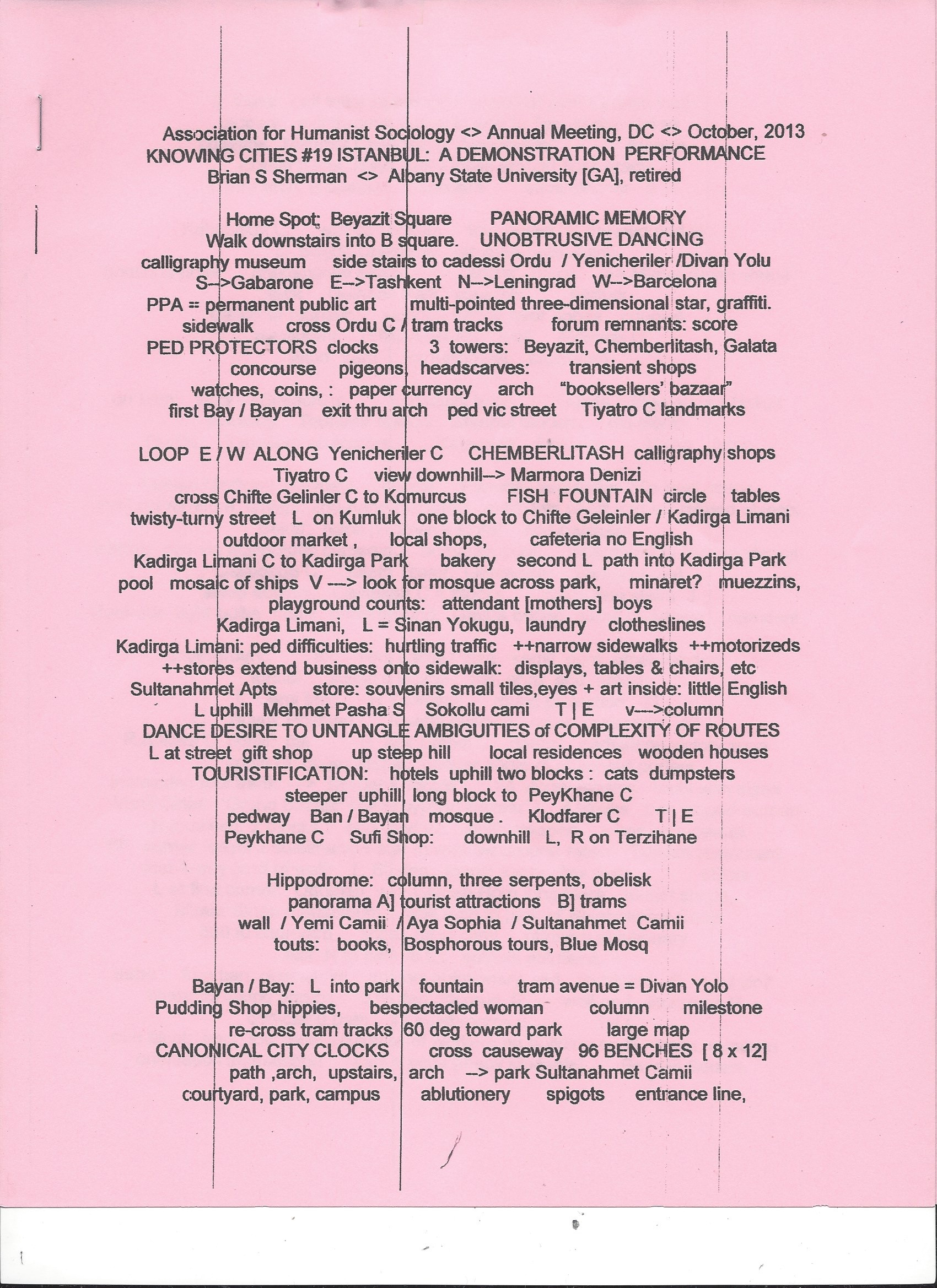 scanned document of written text on pink paper