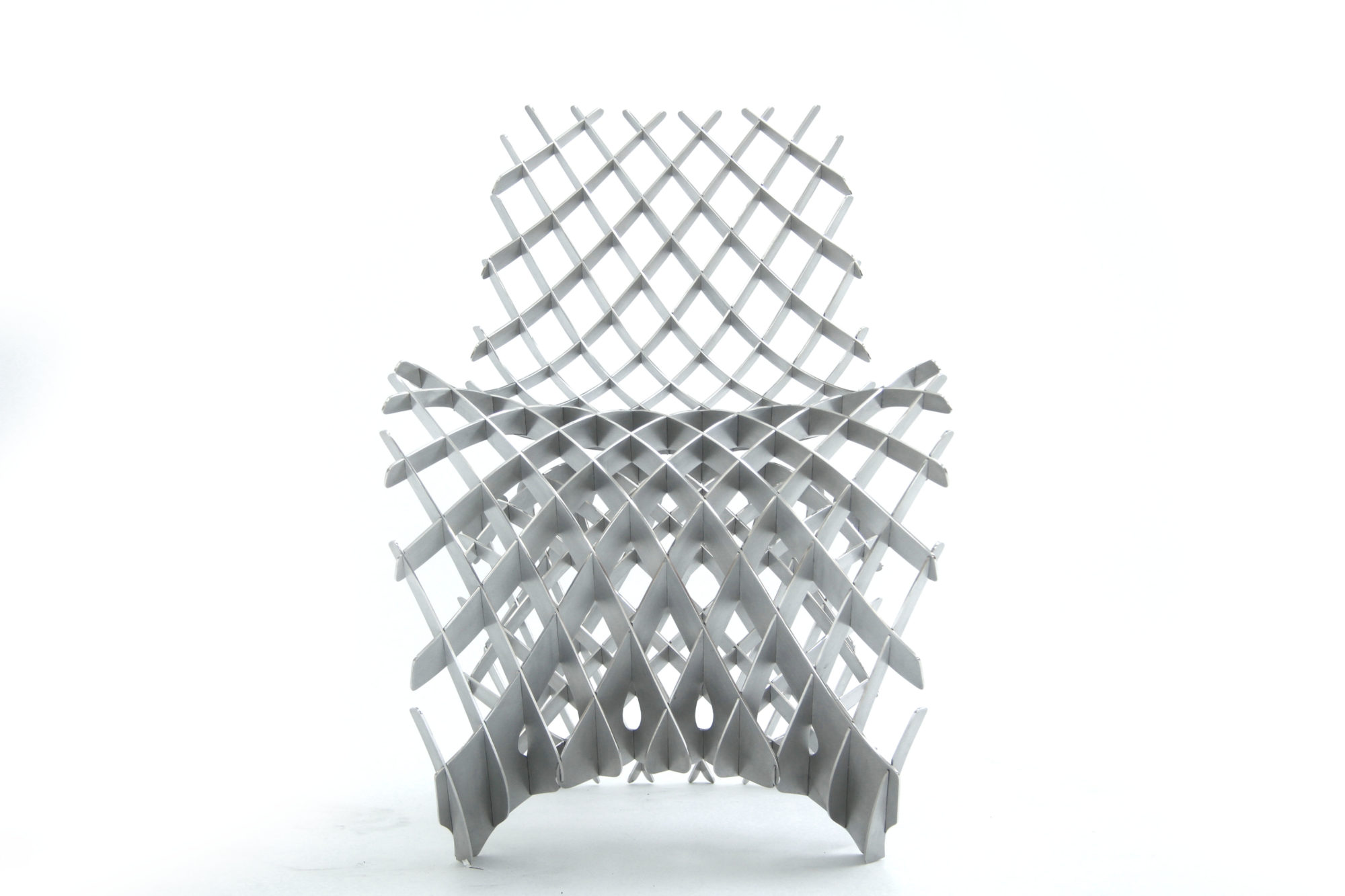 a white chair of open mesh diamonds