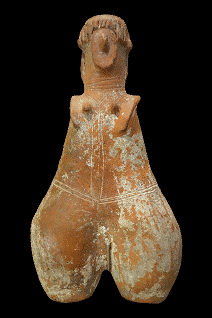 An ancient stone statue of a goddess, dancing.