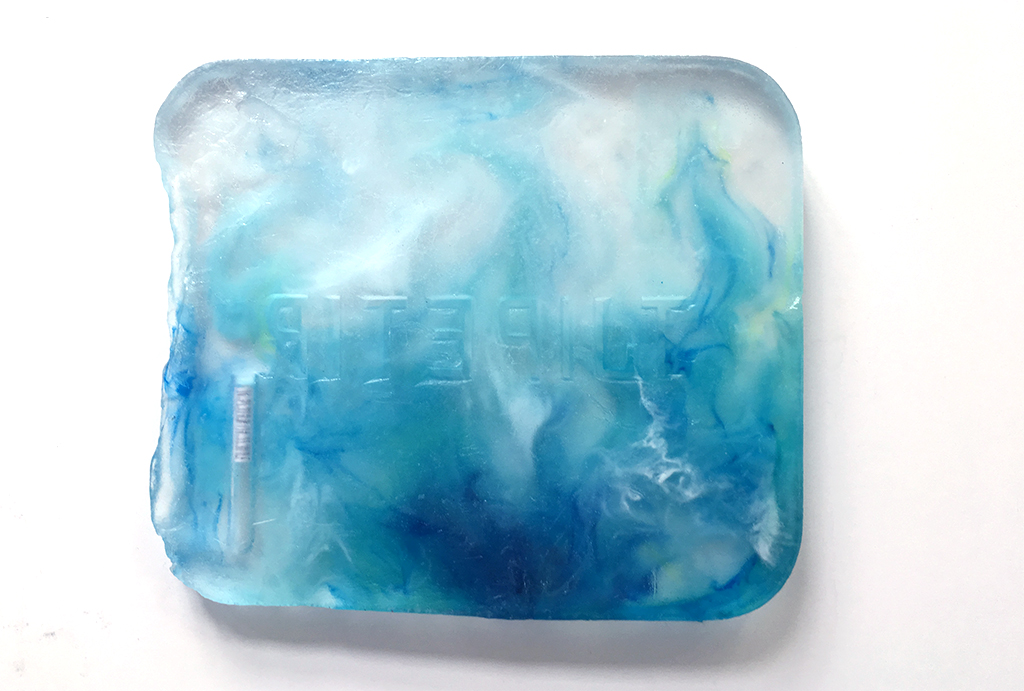 clear tile with waved blue and green pigment