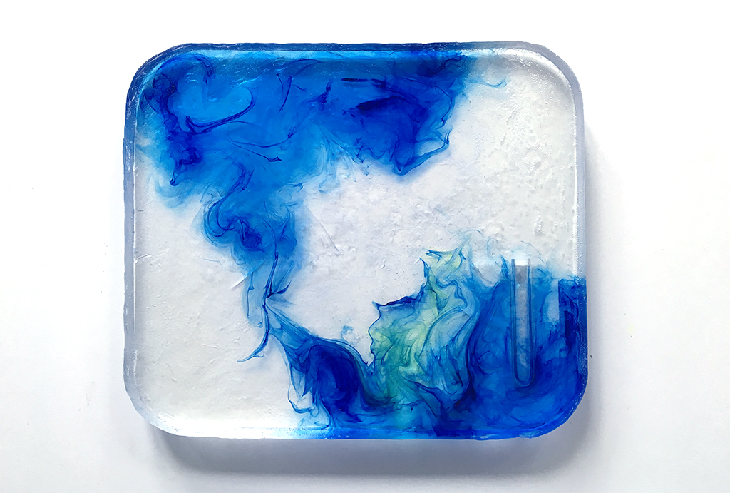 clear tile with waved blue and green pigment