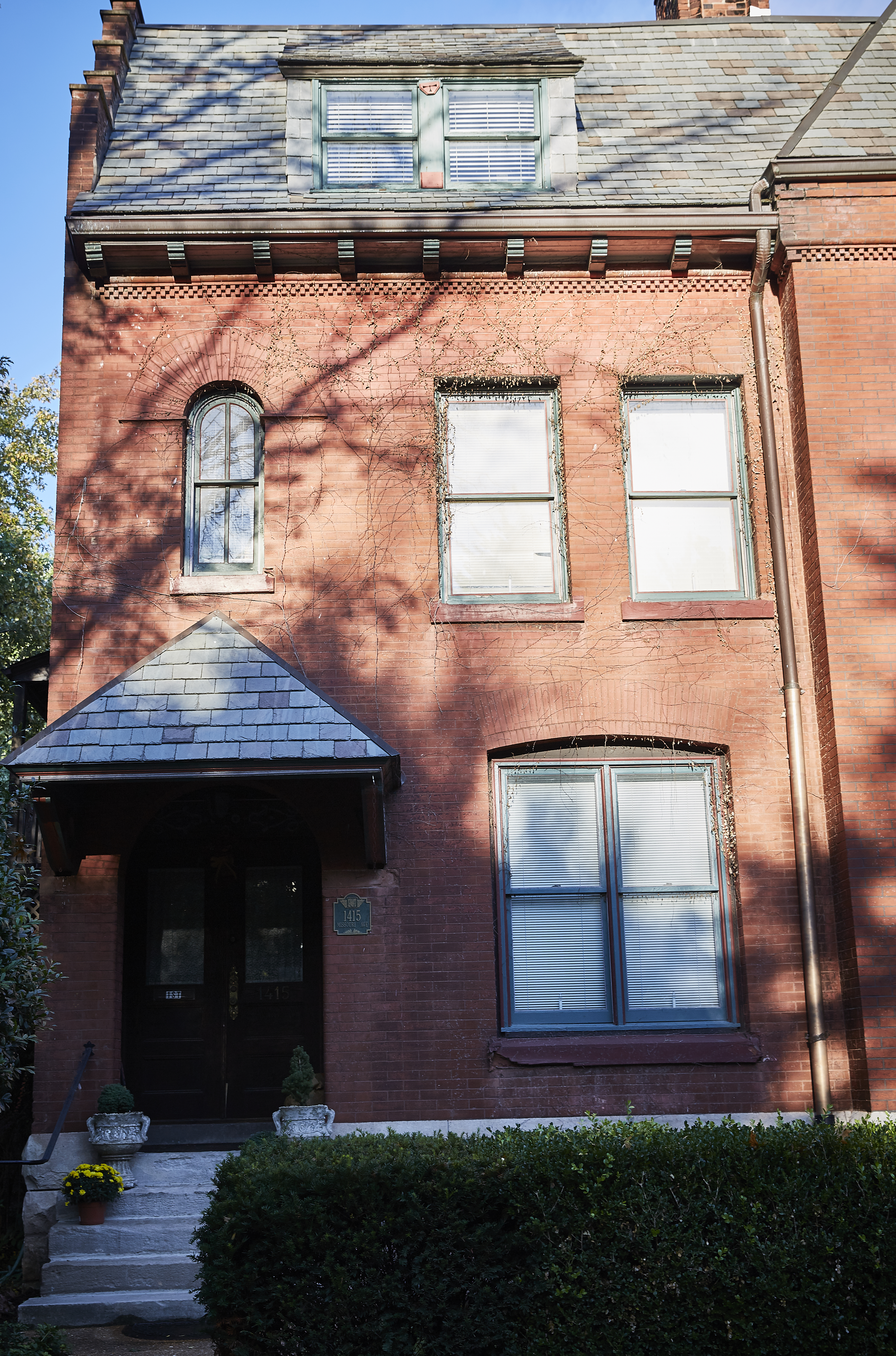 front view of a large brick house