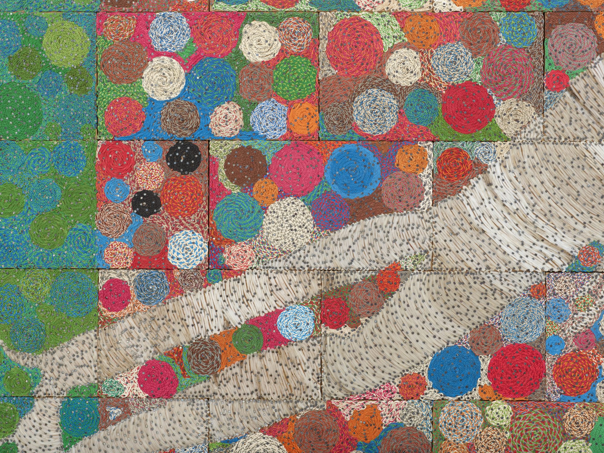 mosaic pattern colorful circles with a cream diagonal section