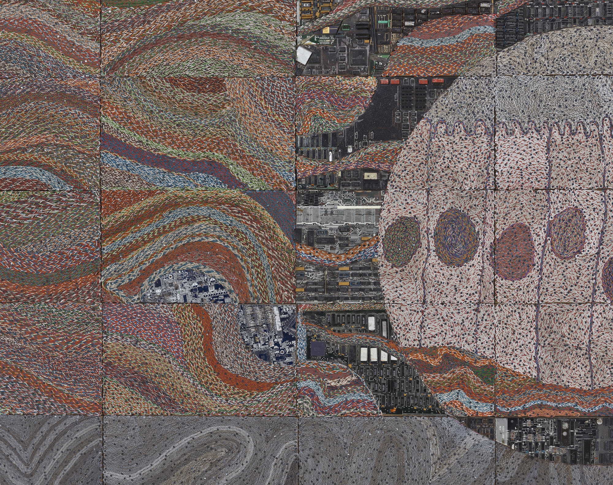 mosaic of muted swirling colors with gray and black sections around a mauve circular shape