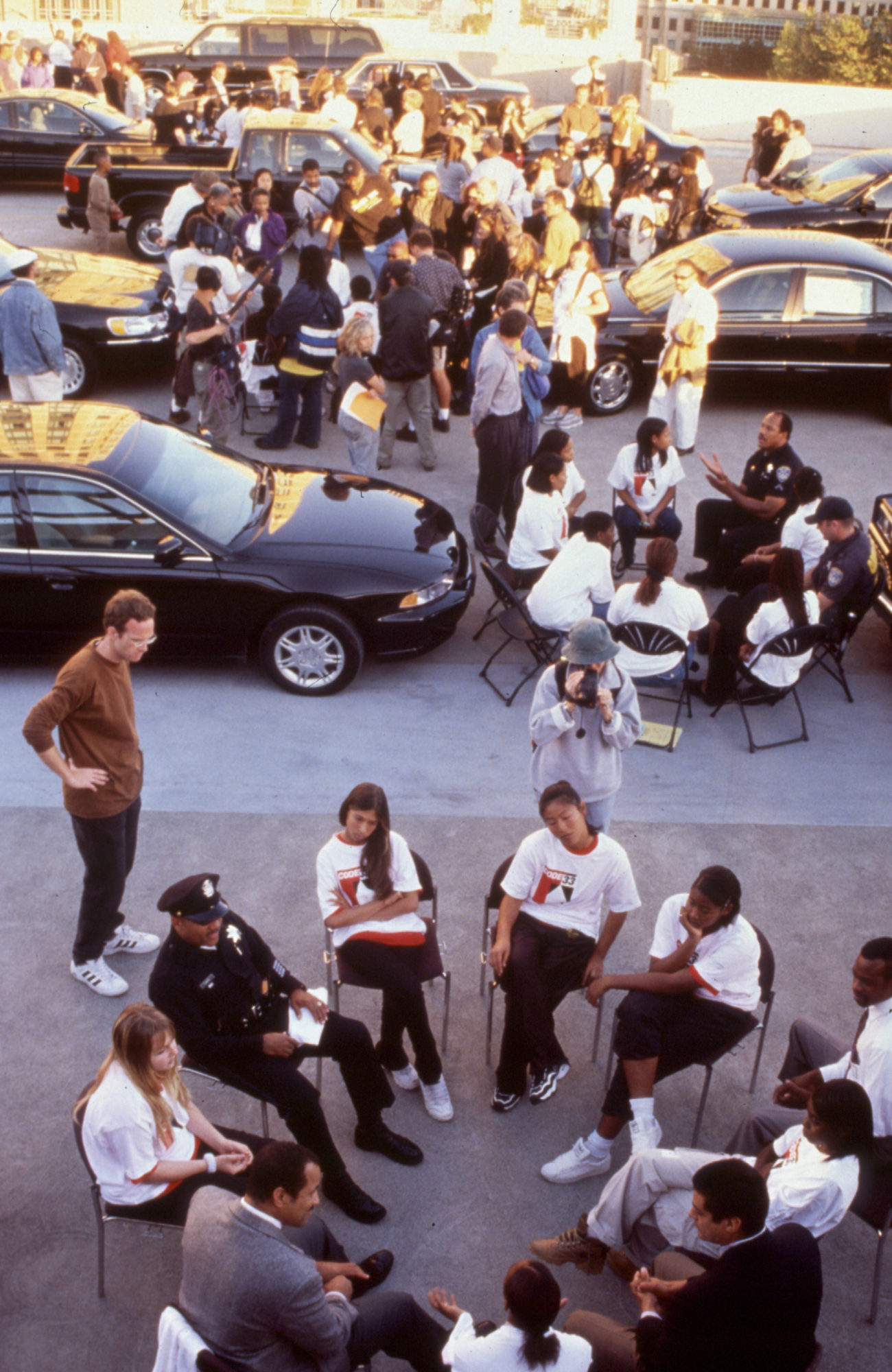 Women in circle with police