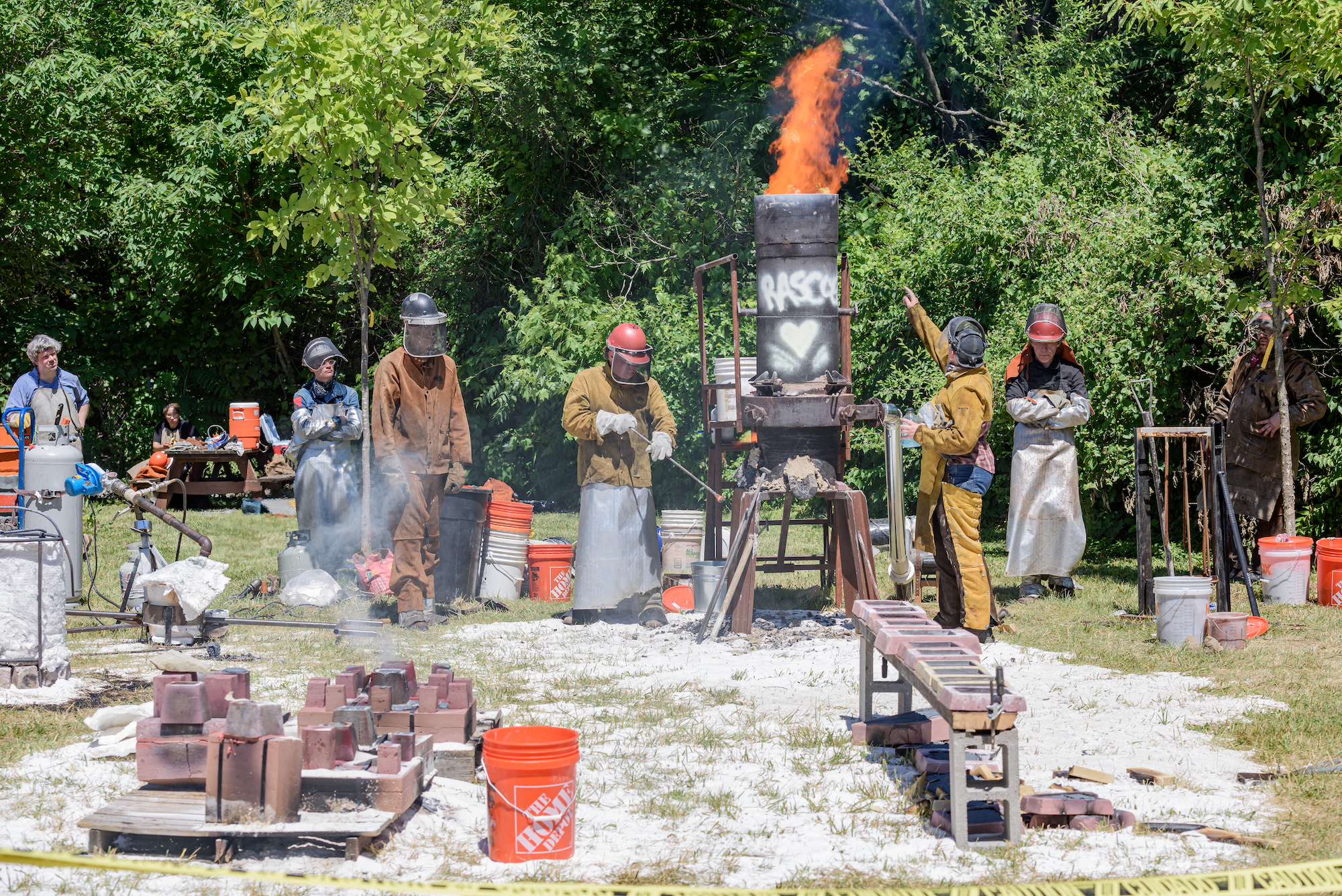 A community iron pour at Falls Art Foundry hosted by the Speed Art Museum Saturday, June 18, 2022, in the Portland neighborhood as part of “The Promise” workshop reflecting on guns and gun violence affecting the Black community in Louisville, Ky. (Photo by Brian Bohannon)