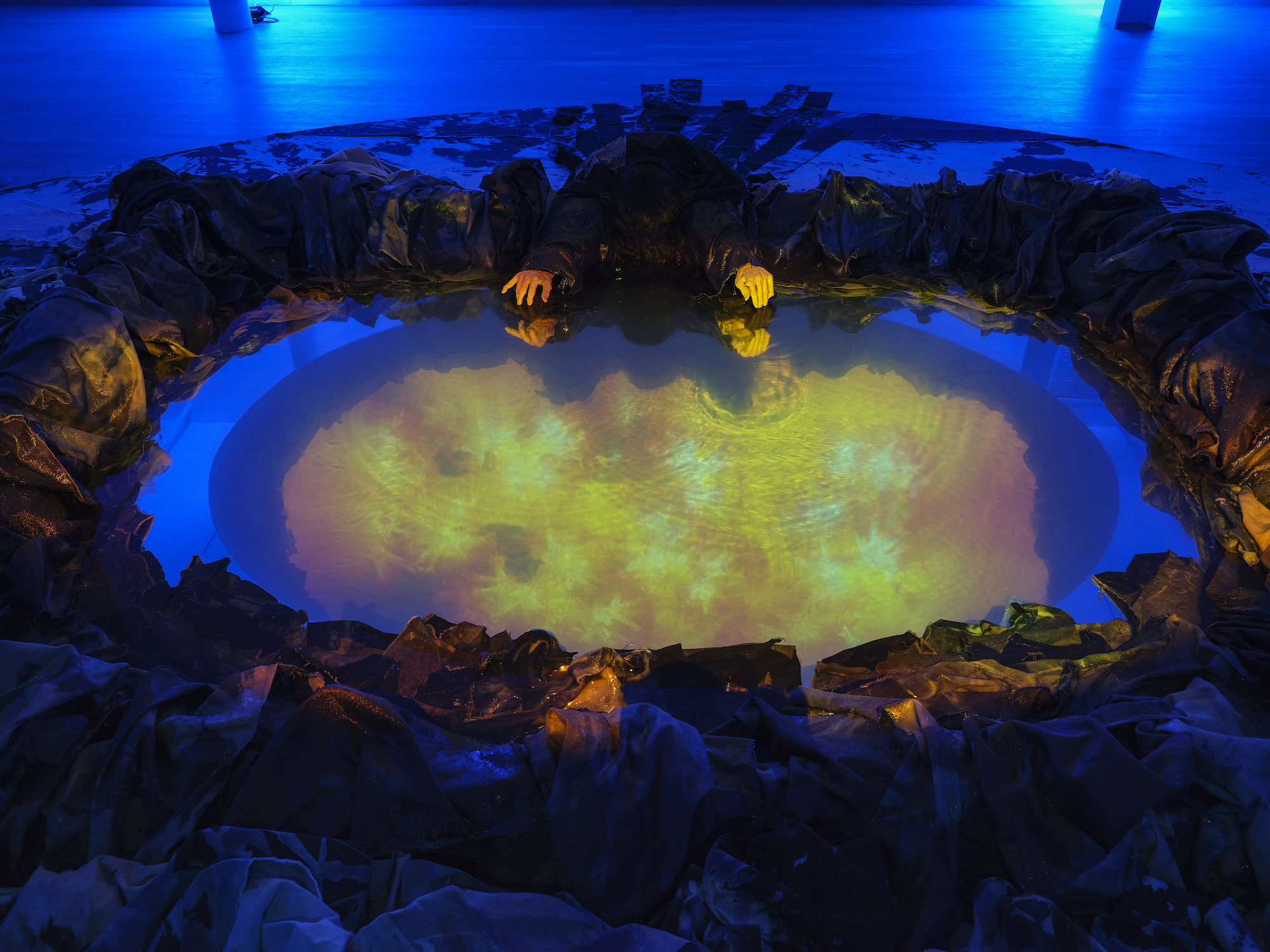 A body of water with a reflection in it