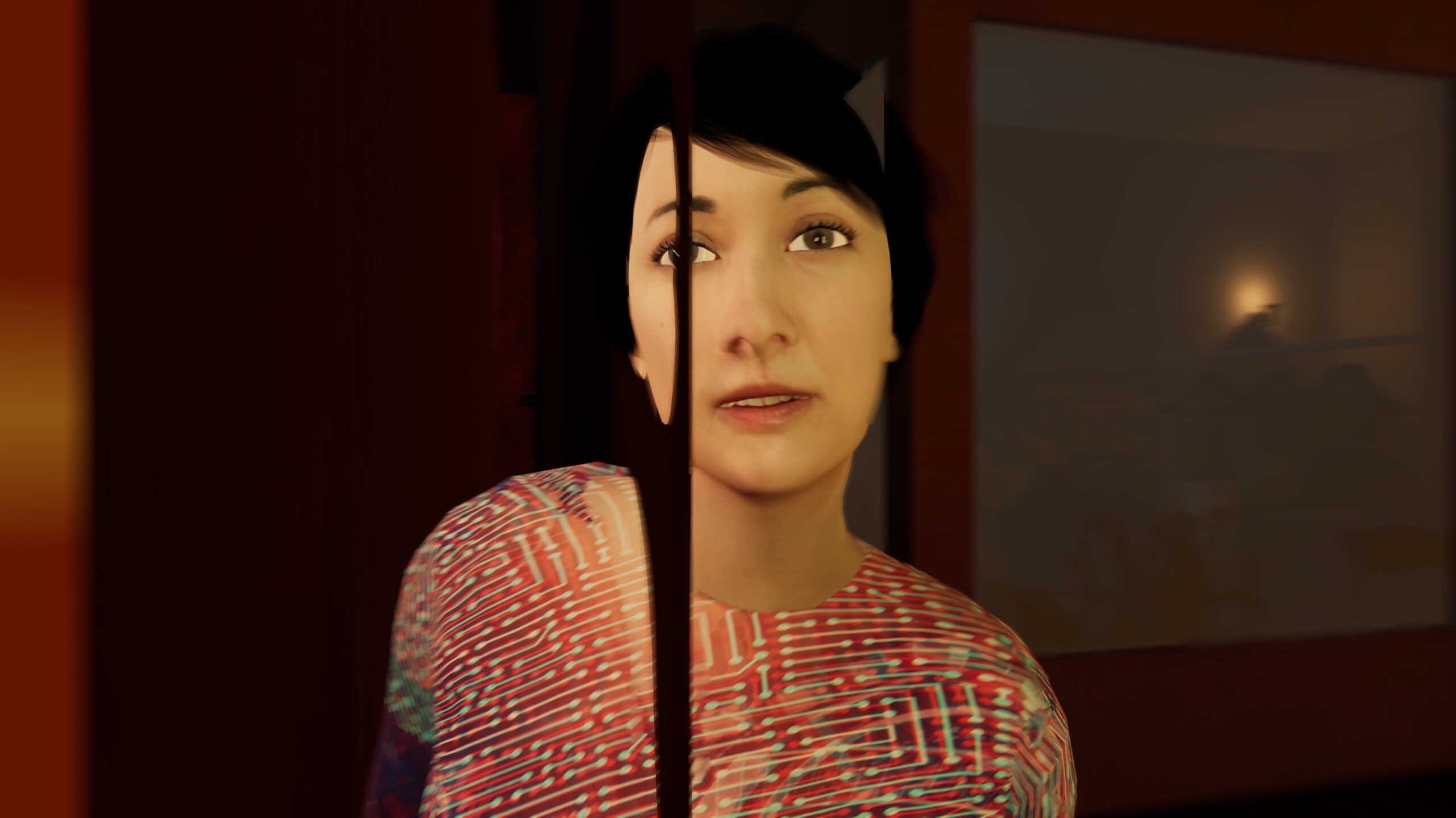 Animated image of a woman with short, black hair looking towards the viewer against a dark backdrop.